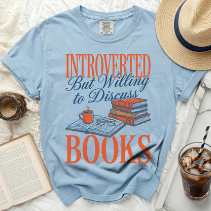 Light blue t-shirt with "INTROVERTED But Willing to Discuss BOOKS" text.