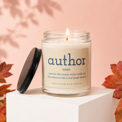 Candle with "author" definition, "a person who creates entire worlds and then refuses to talk to real people about it."