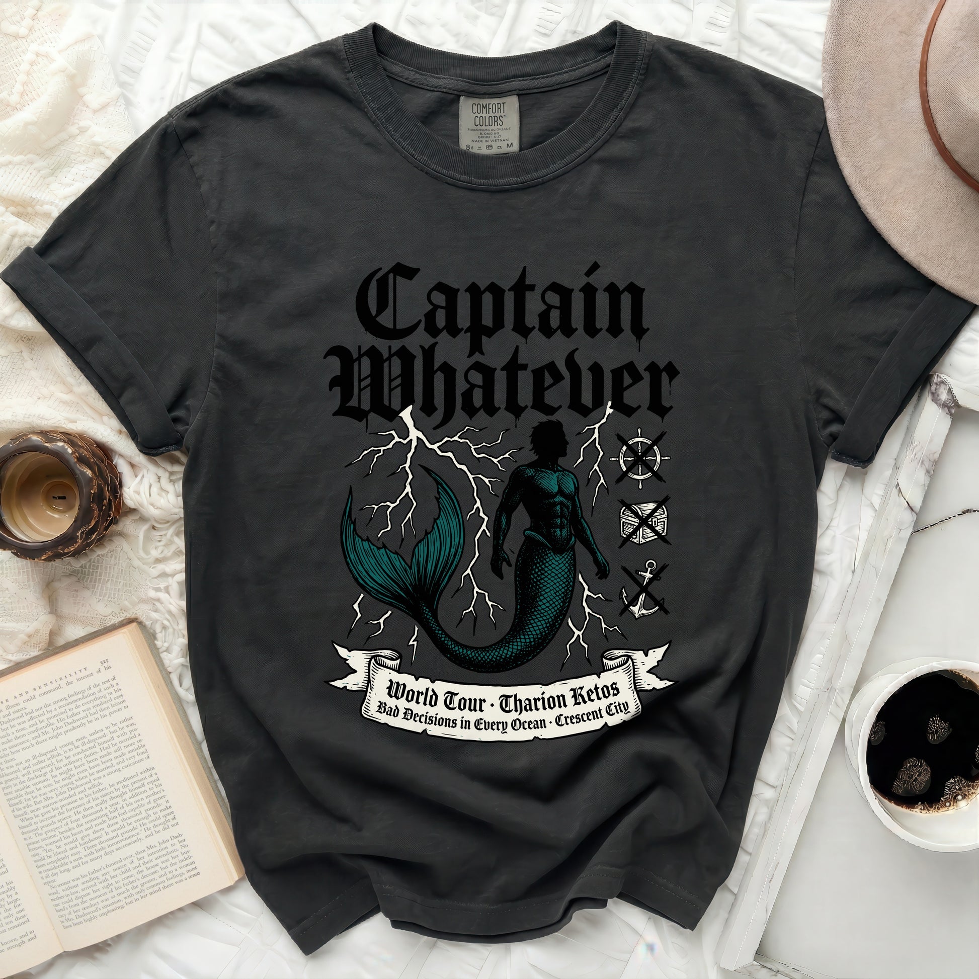 Black t-shirt with "Captain Whatever" and mermaid graphic.