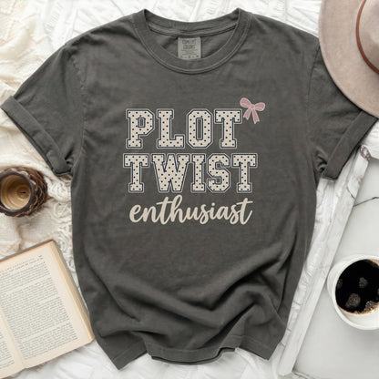 Gray t-shirt with "PLOT TWIST enthusiast" and a pink bow graphic.