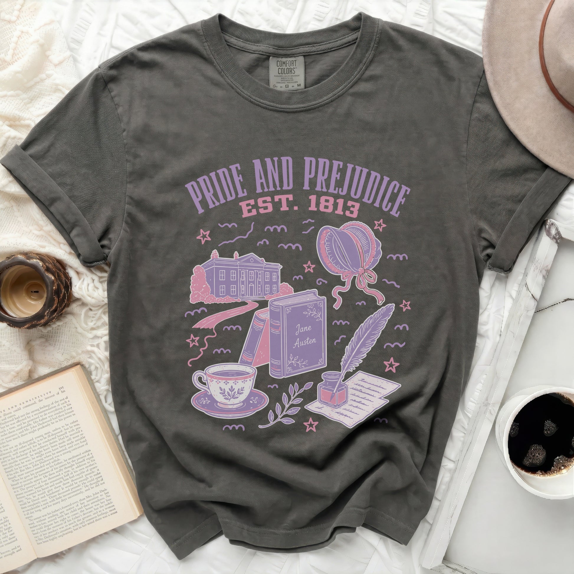 Pride and Prejudice Est. 1813 graphic tee with Jane Austen items.