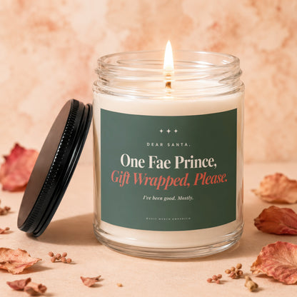 Candle with lid off, reading "One Fae Prince, Gift Wrapped, Please."