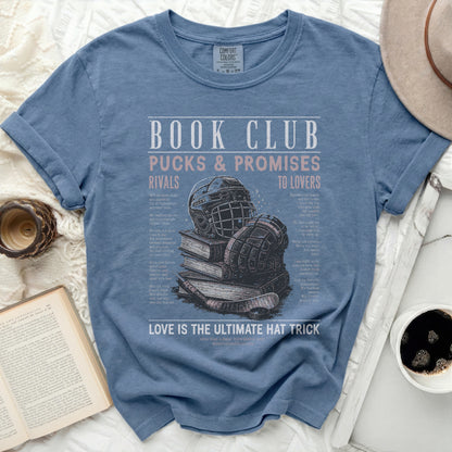 Comfort Colors t-shirt with "Book Club Pucks & Promises" text and hockey imagery.