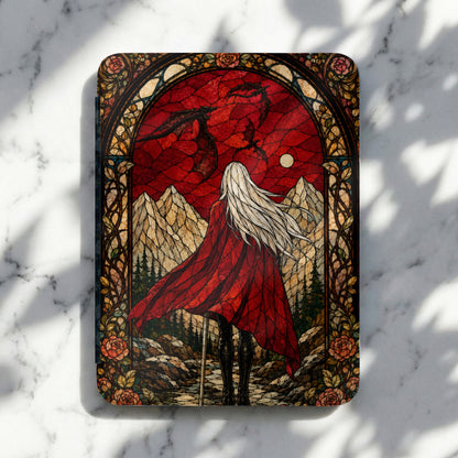 Dragon and person in red cape against stained glass mountains and red sky.