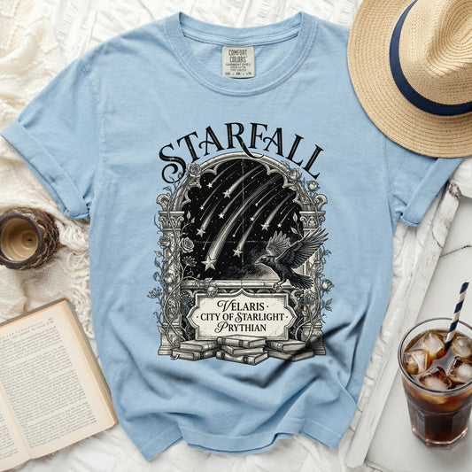 Light blue t-shirt with "Starfall Velaris City of Starlight Prythian" graphic.