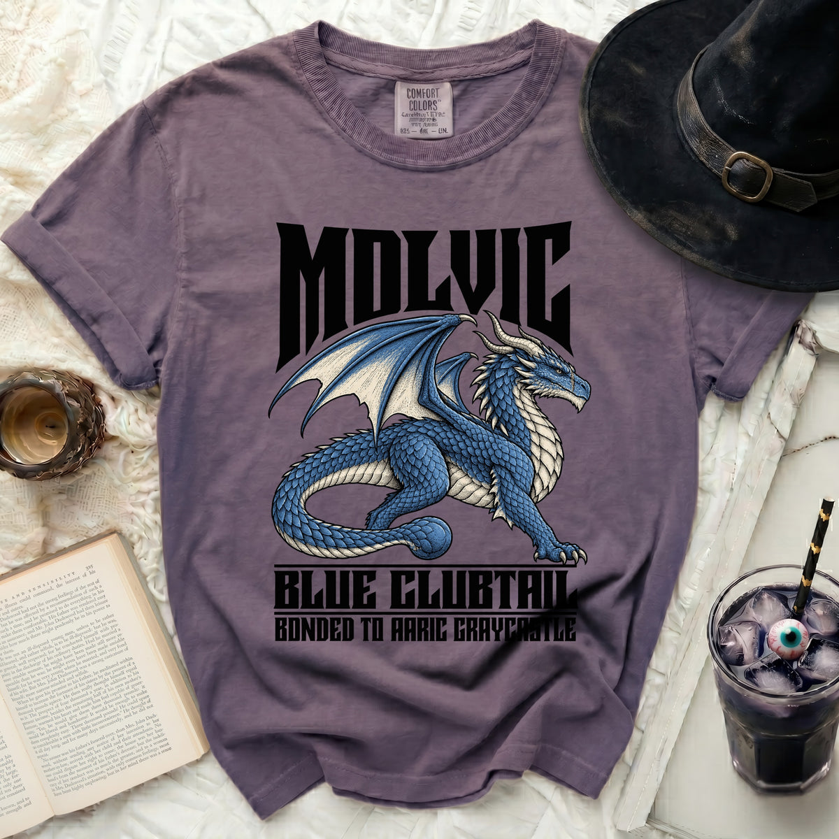 Purple t-shirt with blue dragon graphic, "MOLVIC," "BLUE CLUBTAIL," and text.