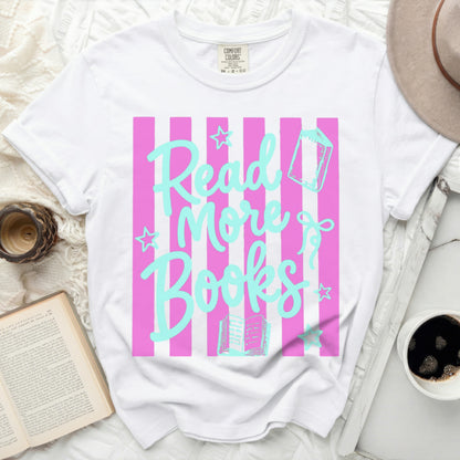 White t-shirt with pink and blue stripes and "Read More Books" graphic.