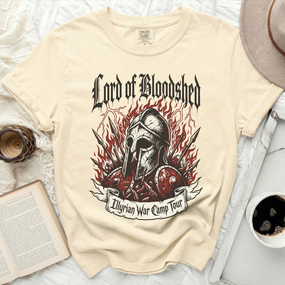 Cream t-shirt with "Lord of Bloodshed" and "Illyrian War Camp Tour" graphic.