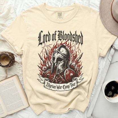 Cream t-shirt with "Lord of Bloodshed" and "Illyrian War Camp Tour" graphic.
