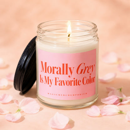 Glass candle with pink label reading "Morally Grey Is My Favorite Color".