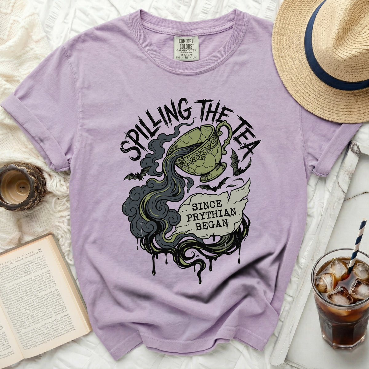 Lilac t-shirt with "Spilling the Tea Since Prythian Began" graphic.