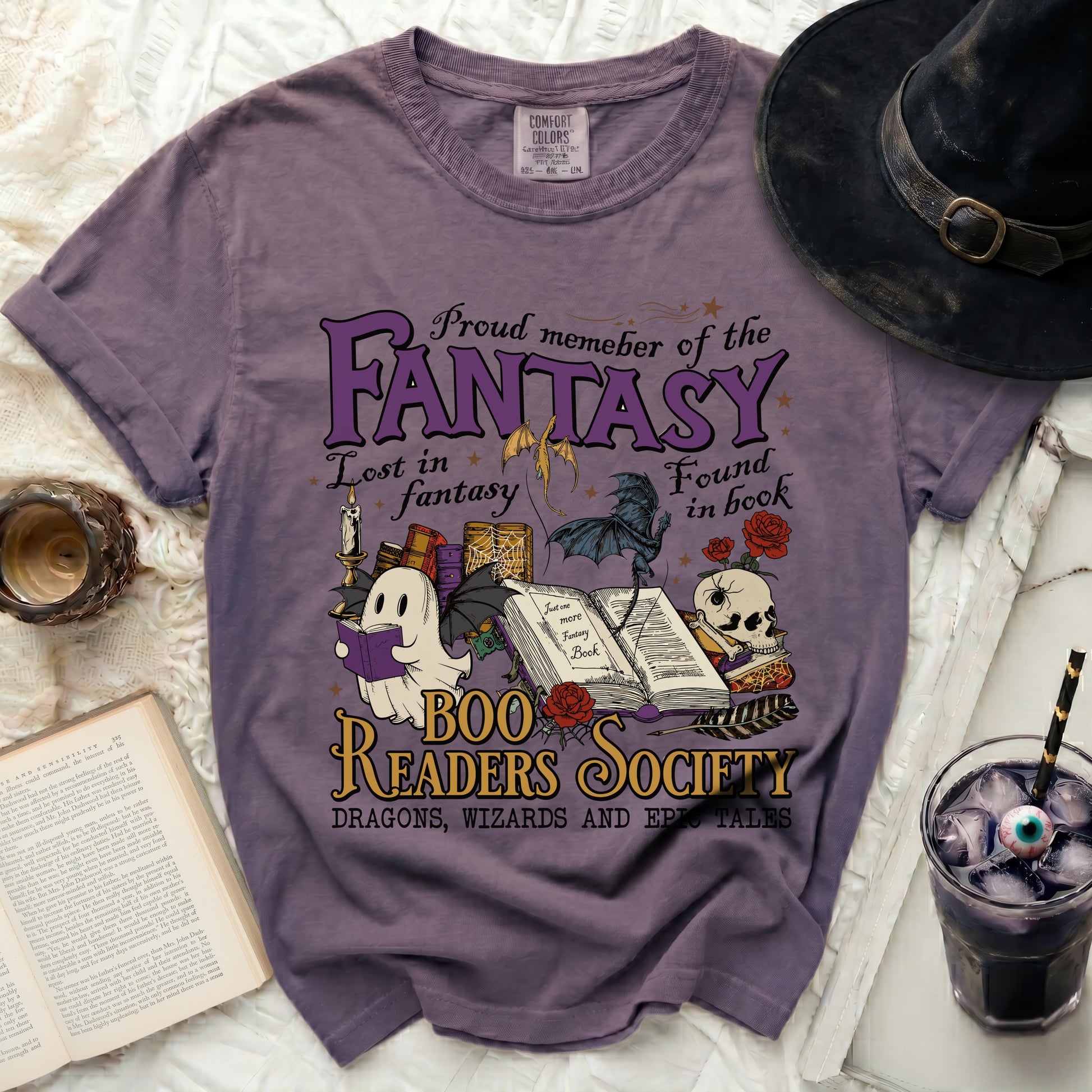 Purple t-shirt with "Boo Readers Society" fantasy-themed graphic.