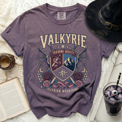 Purple t-shirt with Valkyrie Training Society and Illyrian Mountains graphic.