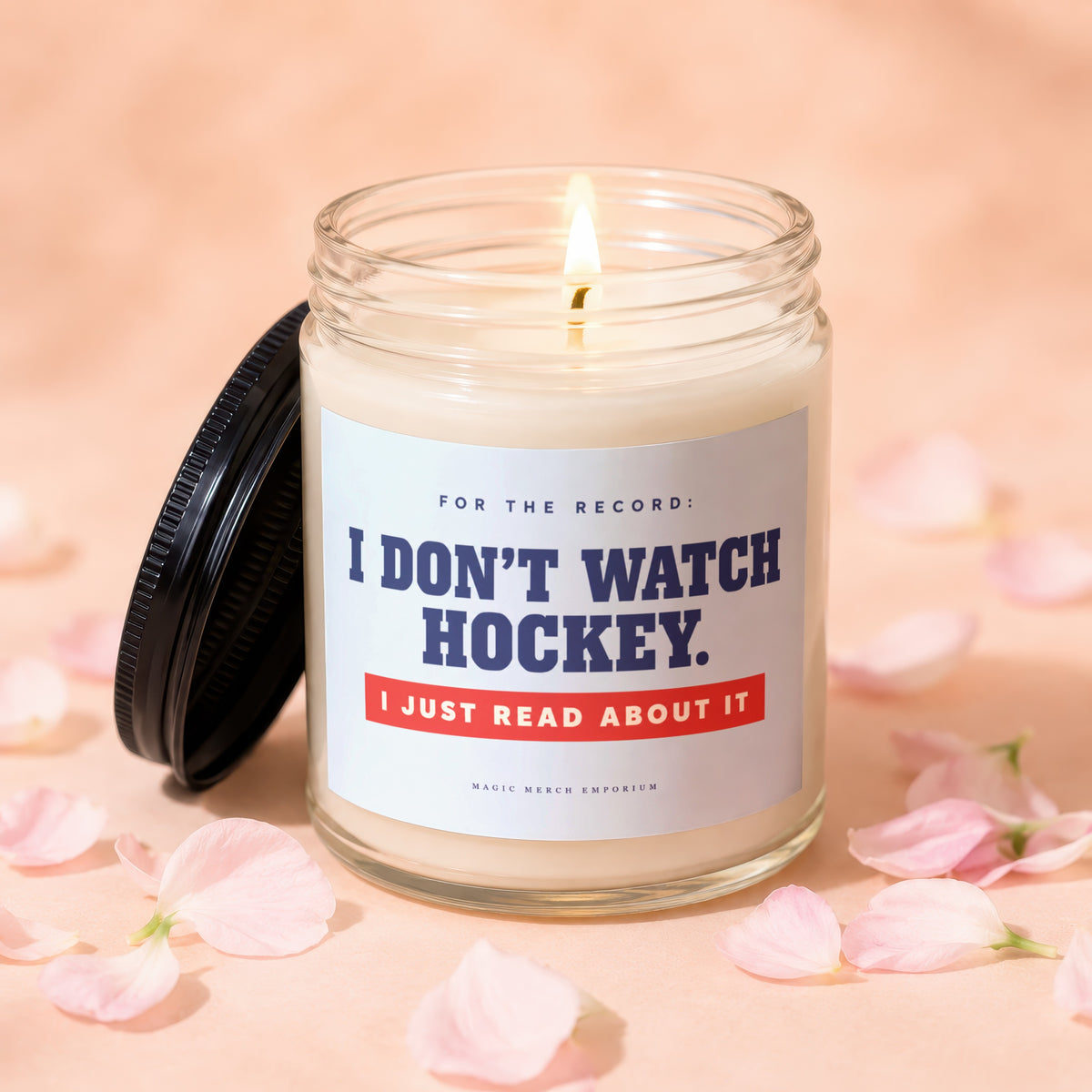 Candle with text "I DON'T WATCH HOCKEY. I JUST READ ABOUT IT."