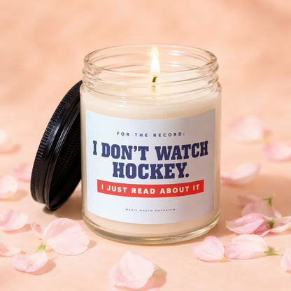 Candle with text "I DON'T WATCH HOCKEY. I JUST READ ABOUT IT."