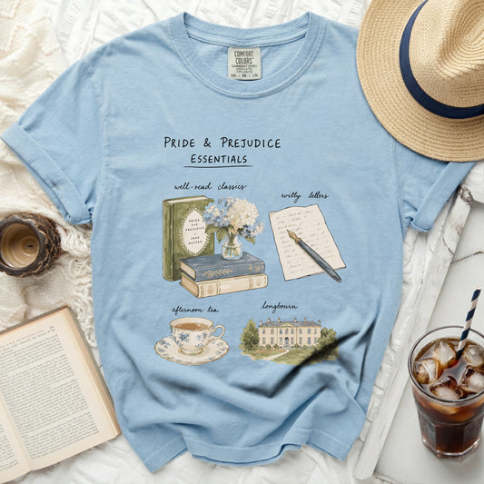 Pride & Prejudice Essentials with book, tea set, letters, and mansion.