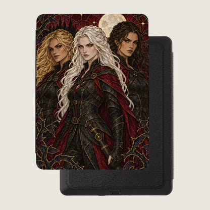 Three women with long hair in ornate armor stand before a starry sky and moon.