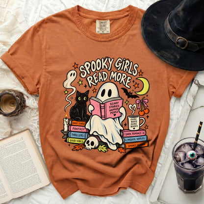 Orange t-shirt with "Spooky Girls Read More" ghost and book graphic.