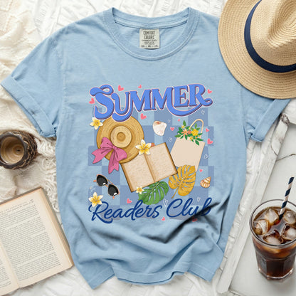 Blue t-shirt with "SUMMER Readers Club" graphic, straw hat, book, and drink.