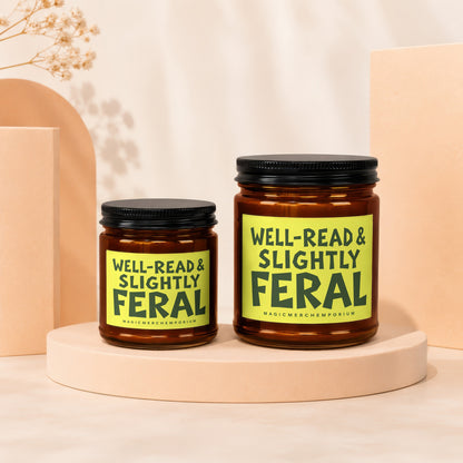 Two amber jars with black lids, one larger than the other, each with a "Well-Read & Slightly Feral" label.