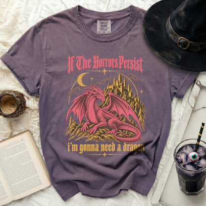 Purple t-shirt with a pink dragon, castle, moon, and text "If The Horrors Persist i'm gonna need a dragon".