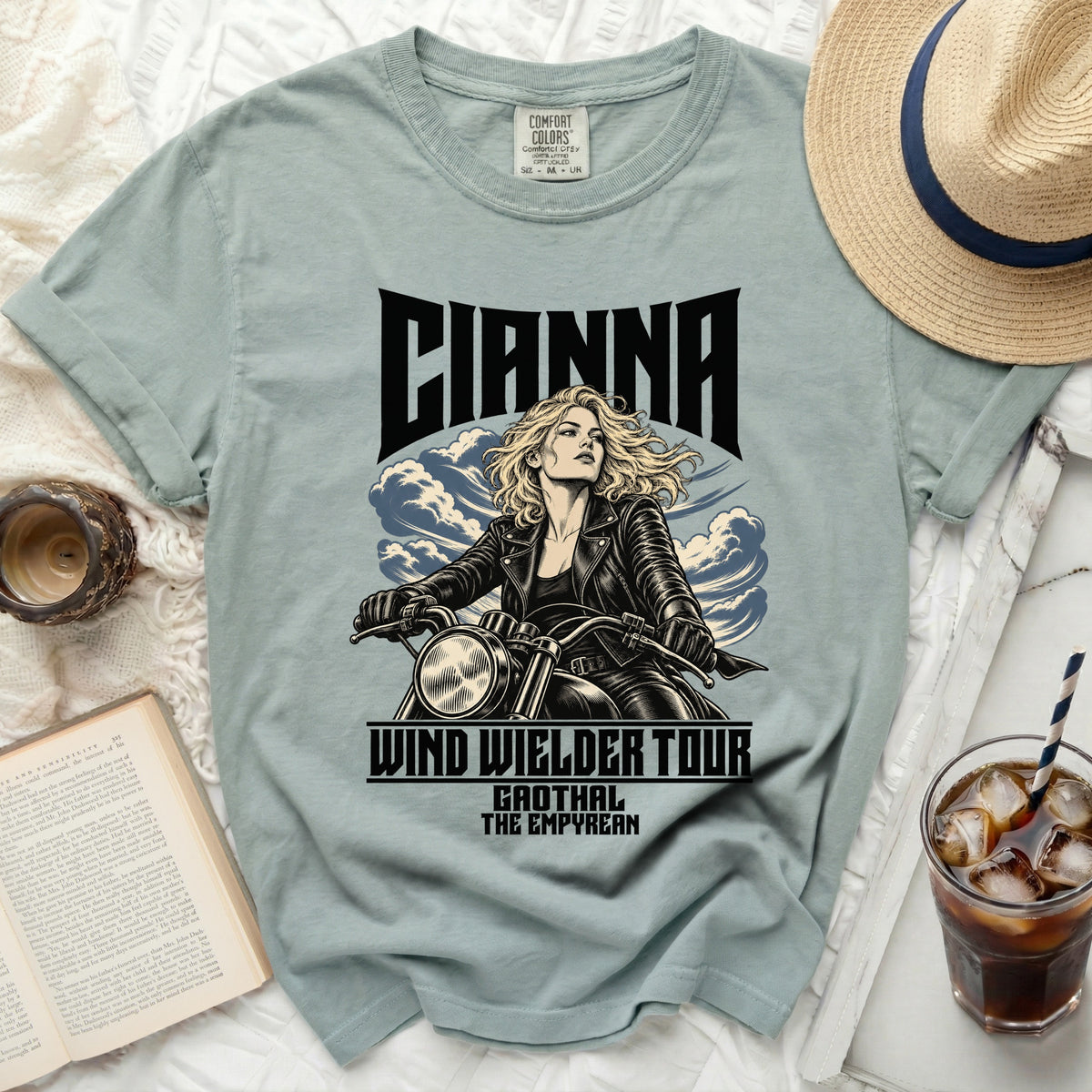 Light teal t-shirt with "CIANNA WIND WIELDER TOUR GAOTHAL THE EMPYREAN" graphic.