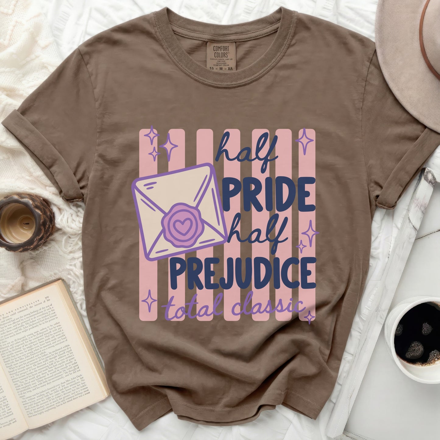 Brown t-shirt with "half PRIDE half PREJUDICE total classic" graphic.