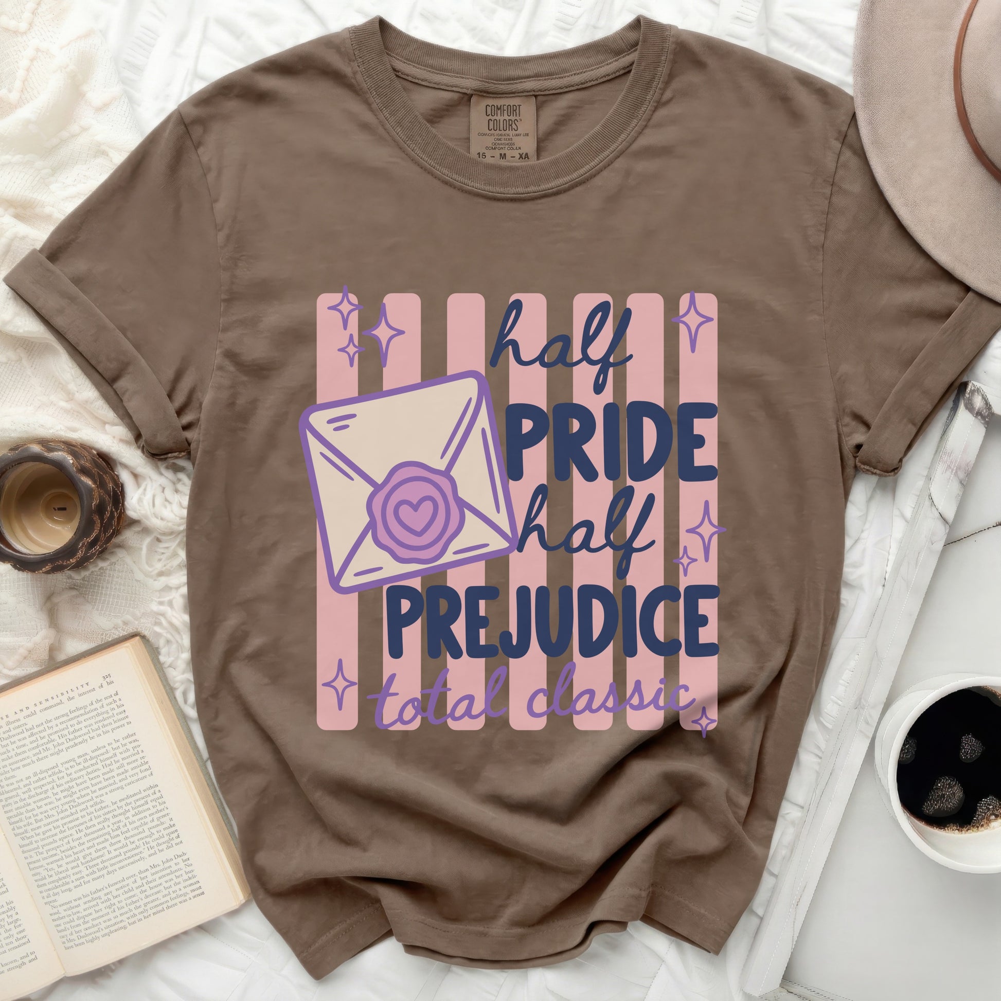 Brown t-shirt with "half PRIDE half PREJUDICE total classic" graphic.