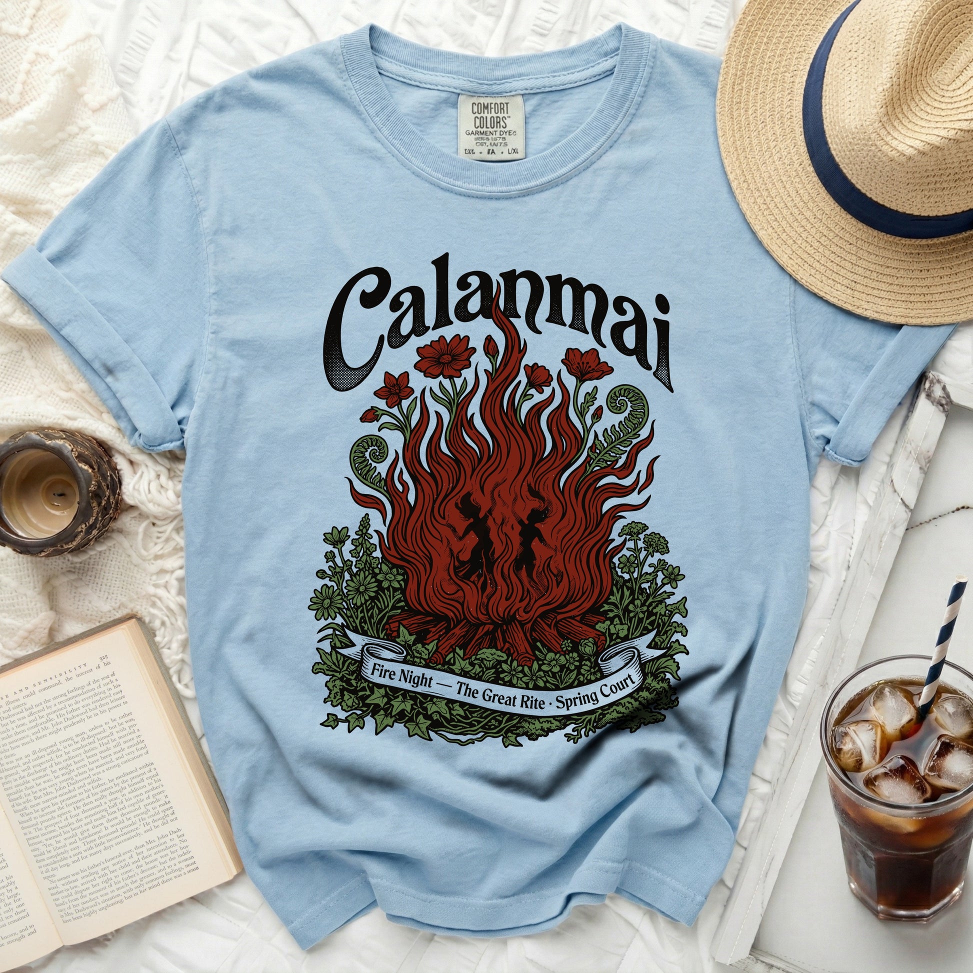 Light blue t-shirt with "Calanmai Fire Night - The Great Rite - Spring Court" graphic.