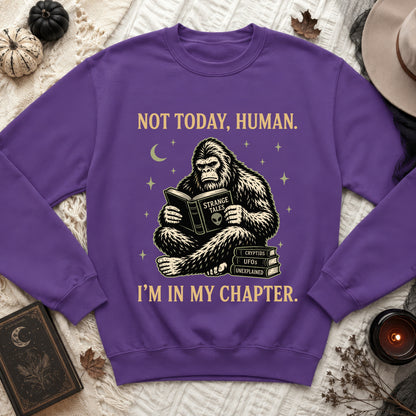 Purple sweatshirt with Bigfoot reading "Strange Tales" and text "Not today, human. I'm in my chapter."