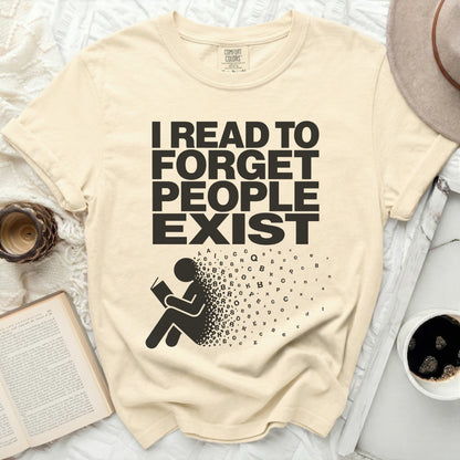 Cream t-shirt with black text reading "I READ TO FORGET PEOPLE EXIST".