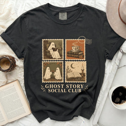 Black t-shirt with "Ghost Story Social Club" and four stamp designs featuring ghosts and books.
