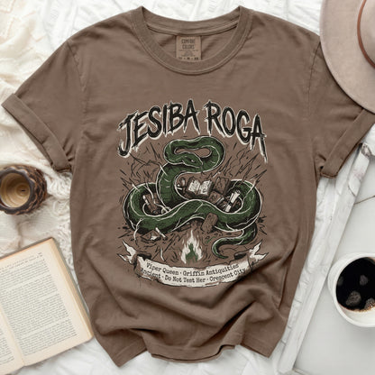 Brown t-shirt with "JESIBA ROGA" and a snake illustration.