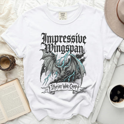 White Comfort Colors t-shirt with "Impressive Wingspan" and "Illyrian War Camp" graphic.