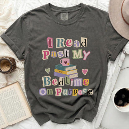 T-shirt with "I Read Past My Bedtime On Purpose" text and stack of books.