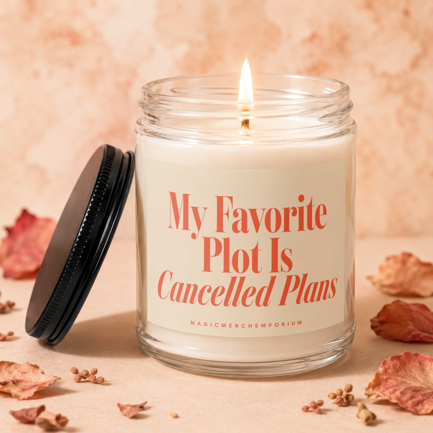 Jar candle with lit flame and text "My Favorite Plot Is Cancelled Plans"