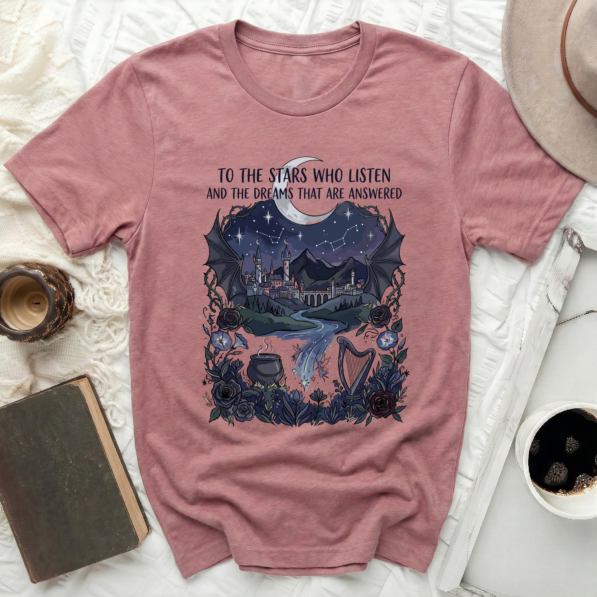 TO THE STARS WHO LISTEN AND THE DREAMS THAT ARE ANSWERED product type
Fantasy shirt, Celestial design, Stars and moon, Castle scene, Night sky top, Bookish apparel, Magical imagery, Witchy aesthetic, Harp cauldron, Dreamy shirt, Literary tee, Mystical clothing, Galaxy design, Floral elements, Pink t-shirt, Unisex tee, Graphic print, Cosmic top, Mythical fashion, Reader gift