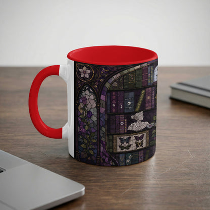 White mug with red handle and interior featuring gothic stained glass book and butterfly design.