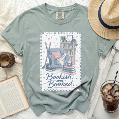 T-shirt with "Bookish and Booked" text and bookshelf illustration.