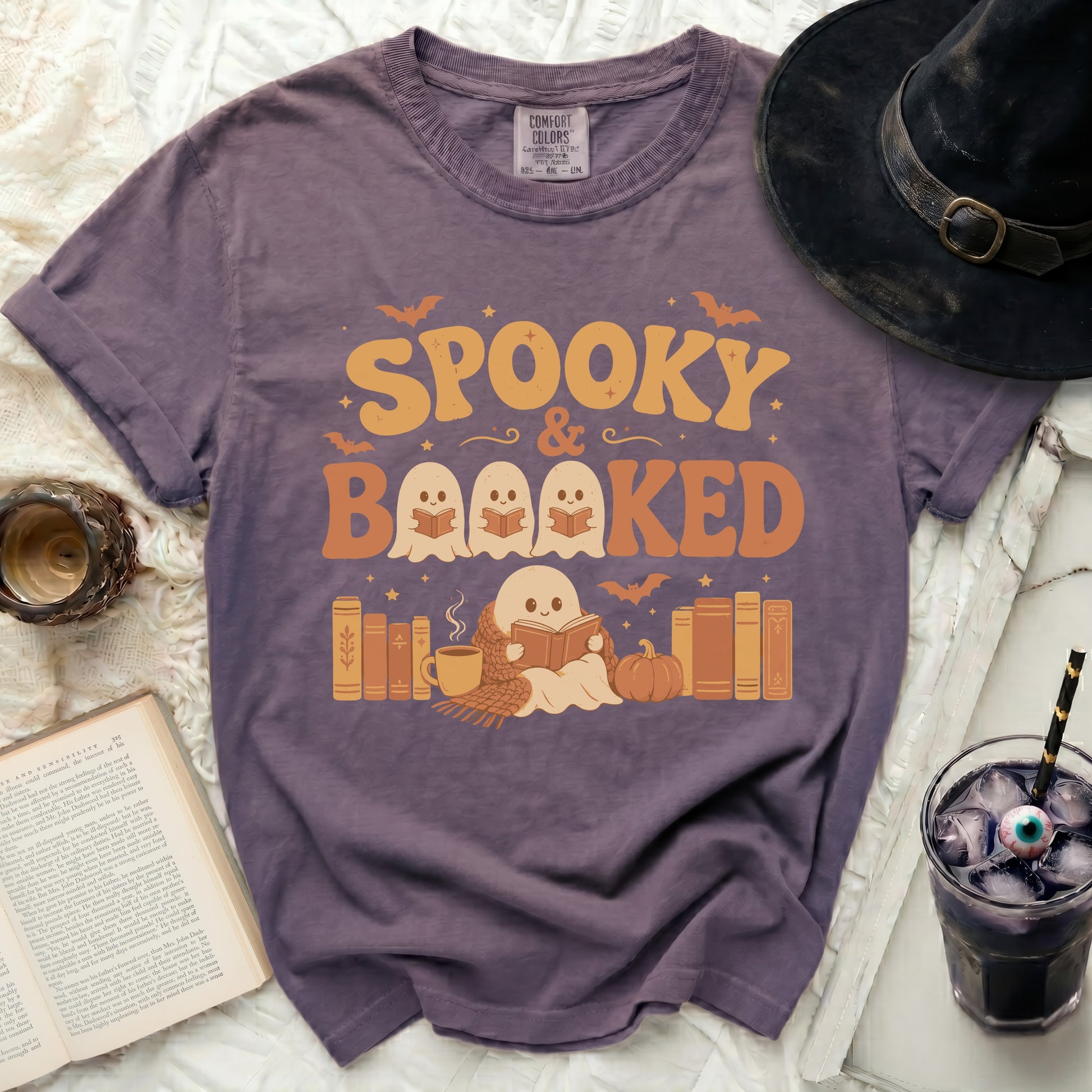 Spooky & Booked Halloween graphic t-shirt with ghosts reading books.