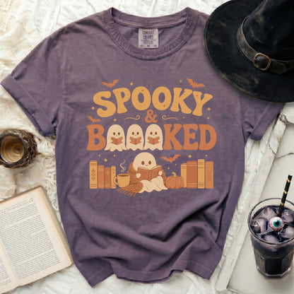 Spooky & Booked Halloween graphic t-shirt with ghosts reading books.
