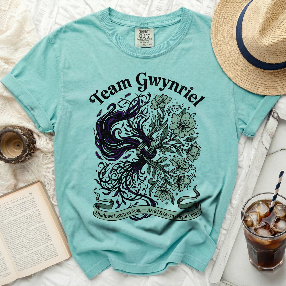 Team Gwynriel shirt with floral and vine design and text.