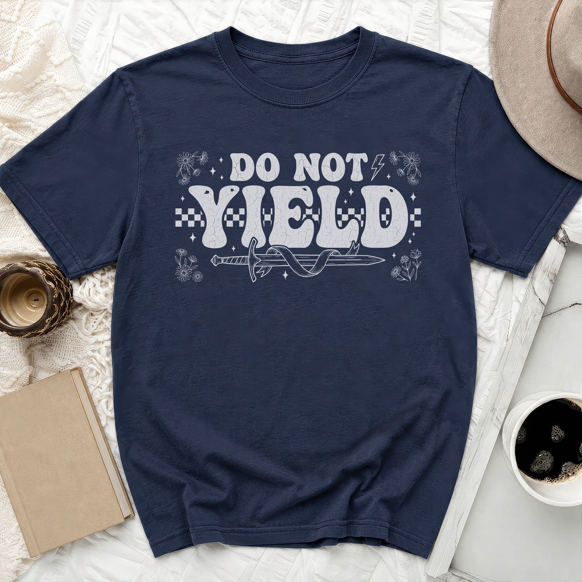 Dark navy t-shirt with white "DO NOT YIELD" text and sword graphic.