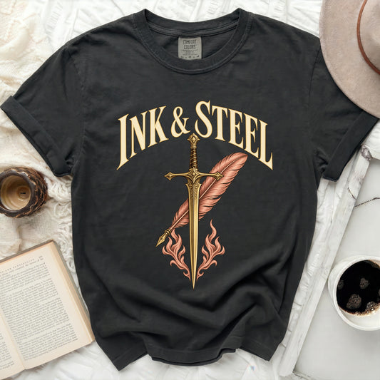 Dark grey t-shirt with "Ink & Steel" text, sword, and feather design.