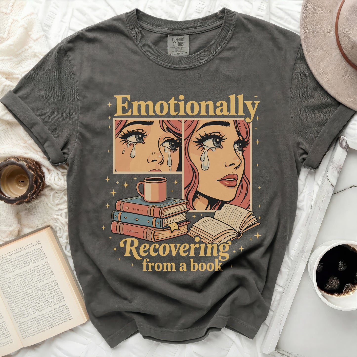 T-shirt with "Emotionally Recovering from a book" graphic and crying eyes.