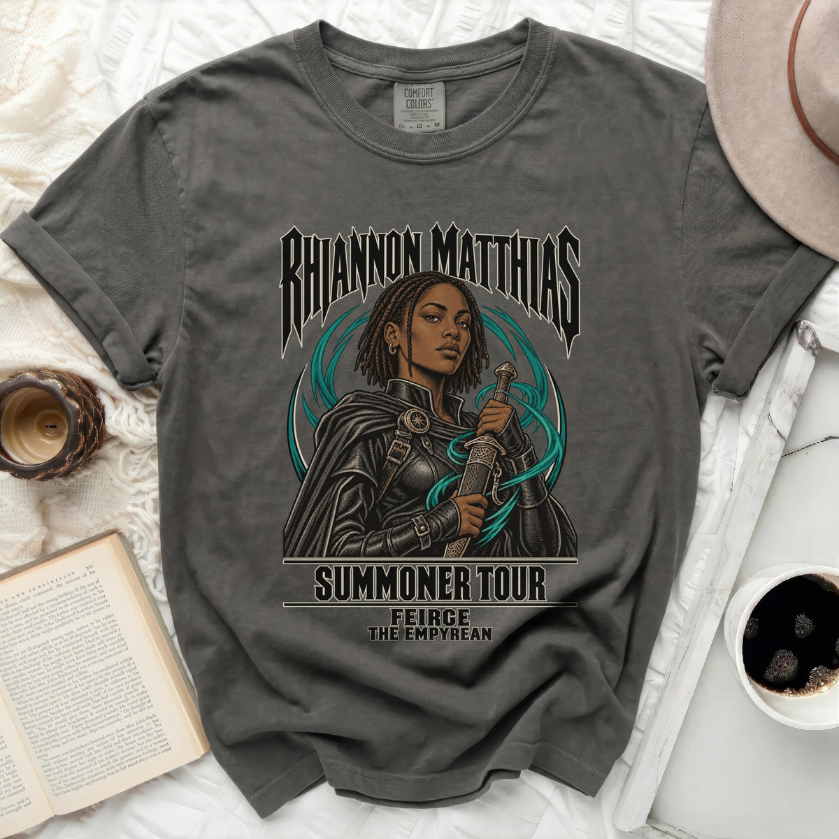 Rhiannon Matthias Summoner Tour t-shirt featuring a woman with sword.