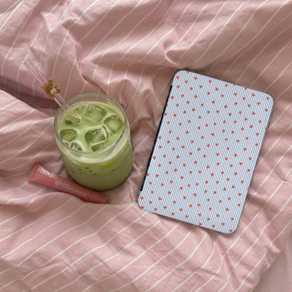 Iced Matcha Latte with Pink Bedding Background Scene
