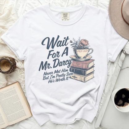 White t-shirt with "Wait For A Mr. Darcy" and literary design.