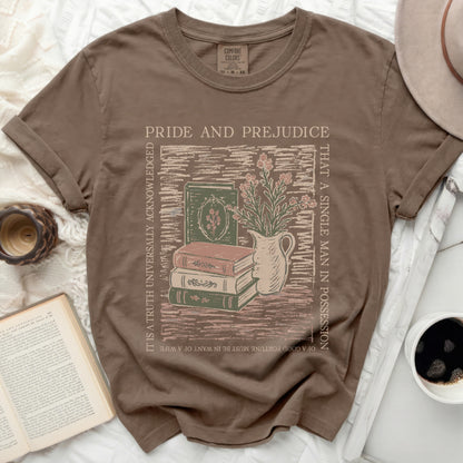 Brown t-shirt with Pride and Prejudice graphic of books and flowers.