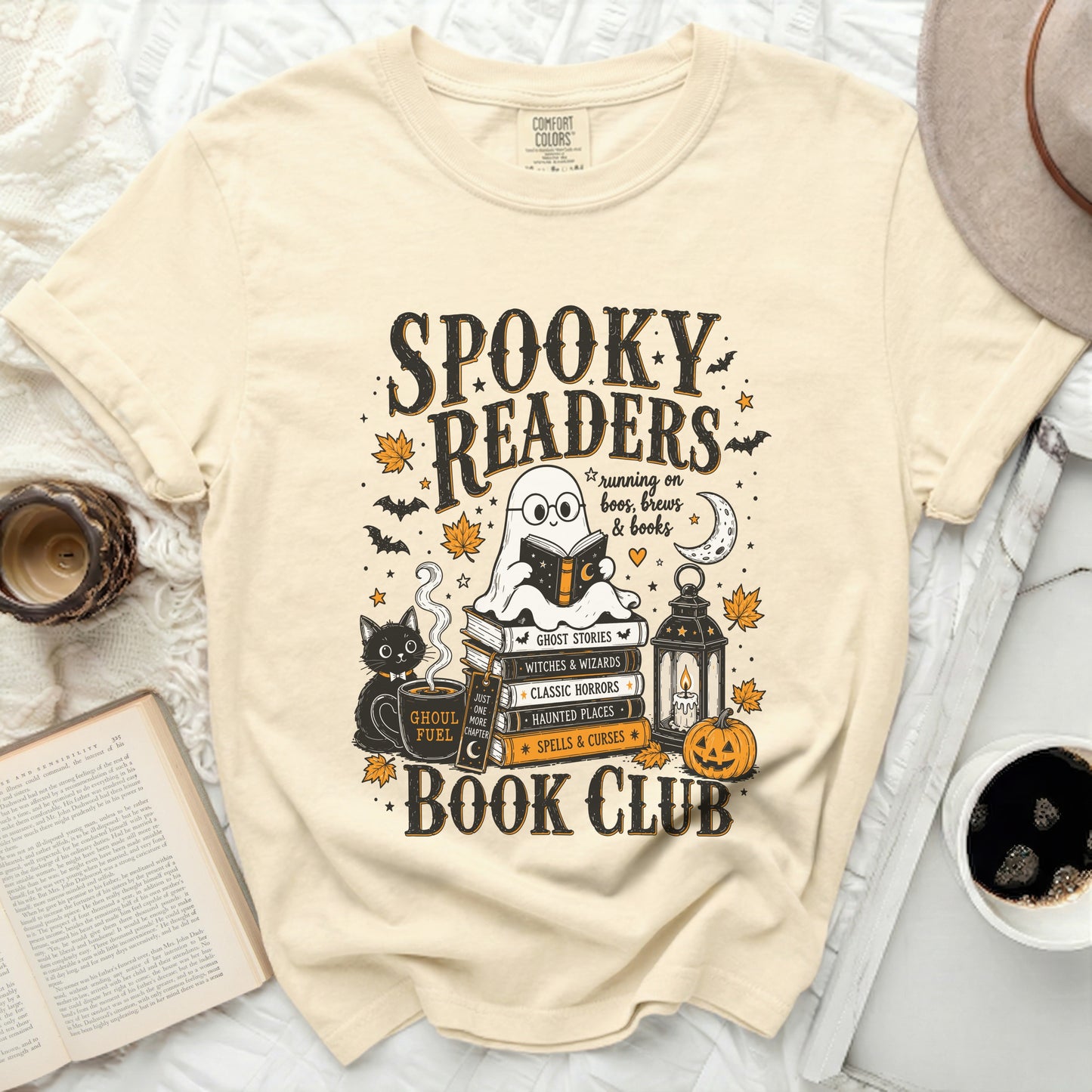 Spooky Readers Book Club graphic with ghost reading on books, cat and pumpkin.